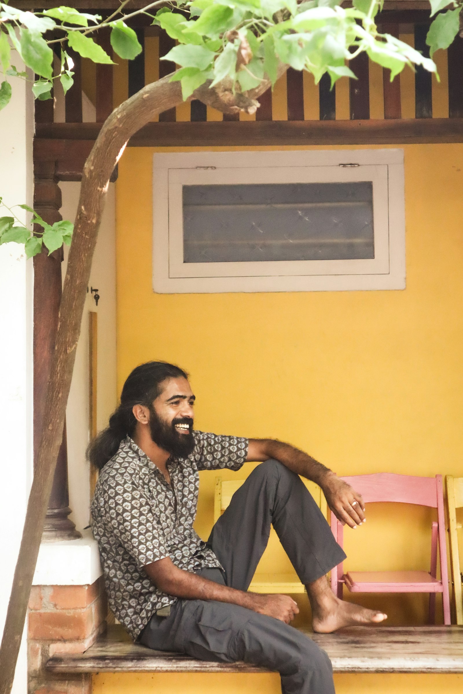 Man smiling and relaxing outdoors